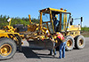 Grader providing the reactionary force for firmness testing